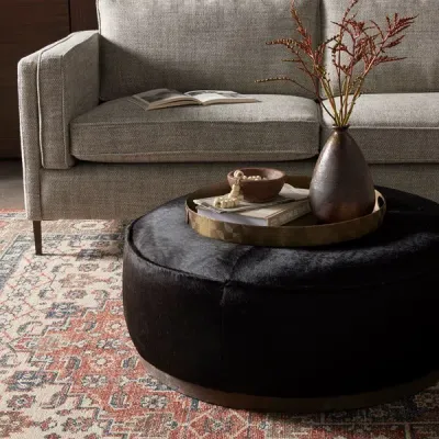 Sinclair Large Round Ottoman Black Hair on Hide