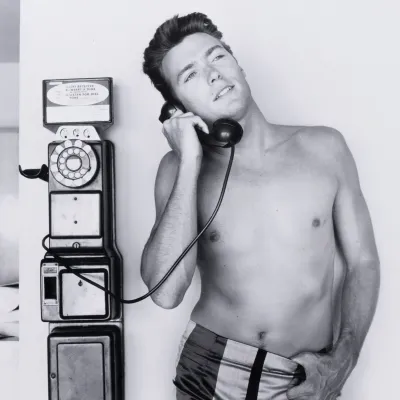 Clint Eastwood Takes A Call By Getty 30" x 30" Photograph