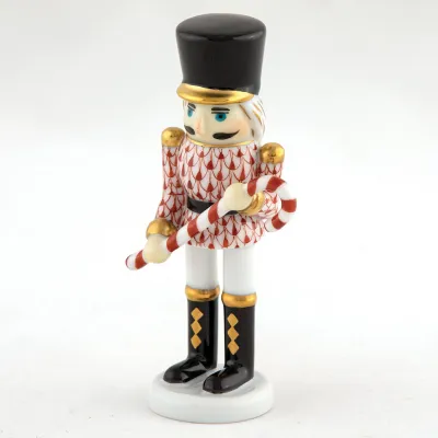 Small Nutcracker W/Candy Cane Rust 2.25 in L X 1.25 in W X 4.25 in H