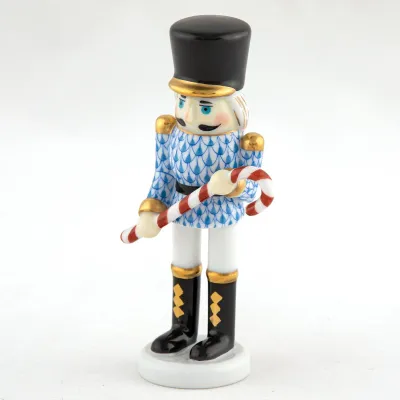 Small Nutcracker W/Candy Cane Blue 2.25 in L X 1.25 in W X 4.25 in H