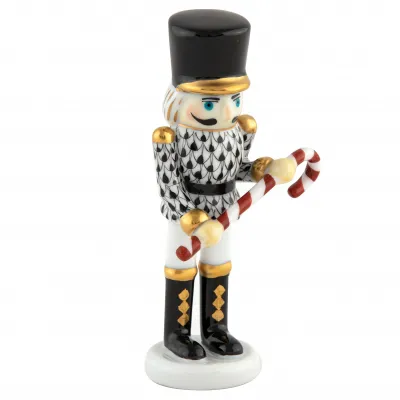 Small Nutcracker W/Candy Cane Black 2.25 in L X 1.25 in W X 4.25 in H