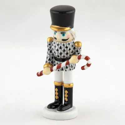 Small Nutcracker W/Candy Cane Black 2.25 in L X 1.25 in W X 4.25 in H