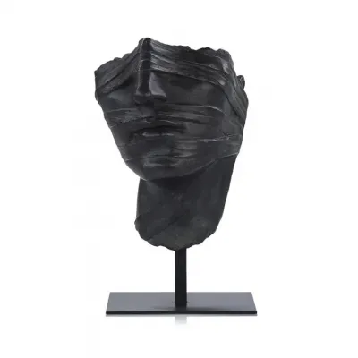 Countenance Sculpture on Iron Base