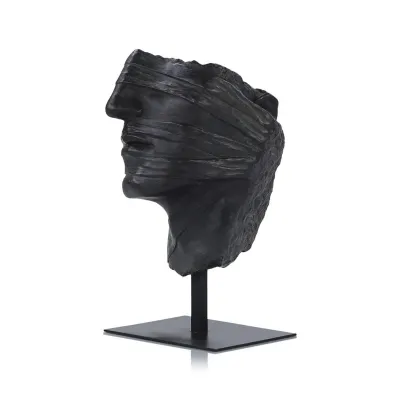 Countenance Sculpture on Iron Base