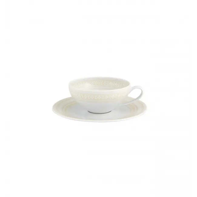 Ivory Tea Cup And Saucer