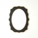Oval Beveled Mirror with Black Glass Sur