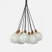 Dax 9-Light 24"D x 60"H White Opaque Resin Brass Metal Chandelier