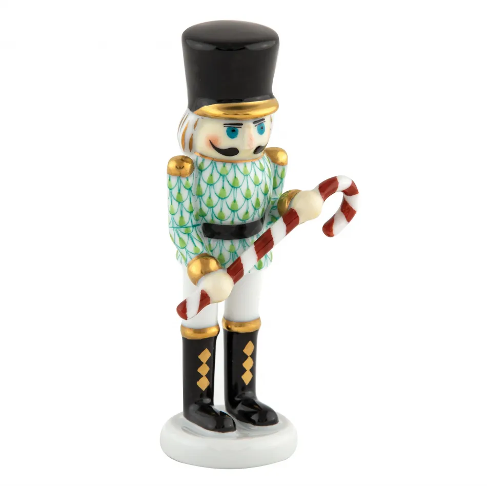 Small Nutcracker W/Candy Cane Key Lime 2.25 in L X 1.25 in W X 4.25 in H