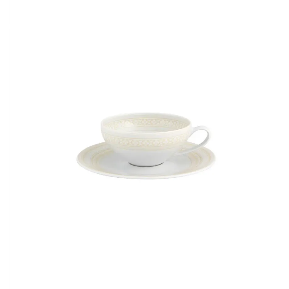 Ivory Tea Cup And Saucer